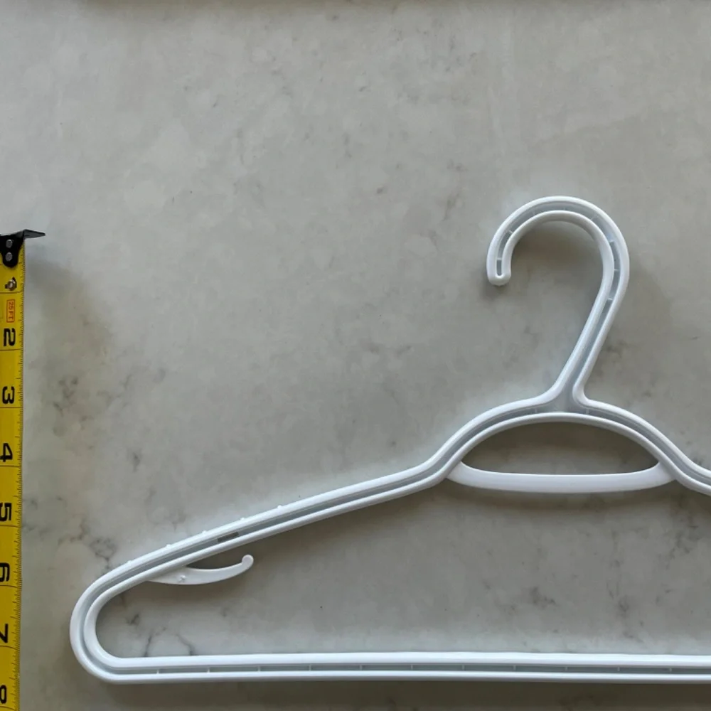 18 White Clothes hangers